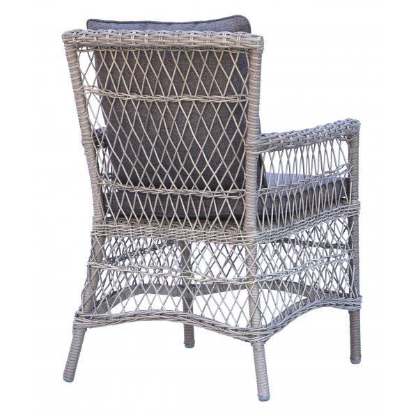 Ulkoruokailutuoli harmaasta rottingista tyynyllä Ulkoruokailutuoli harmaasta rottingista tyynyllä