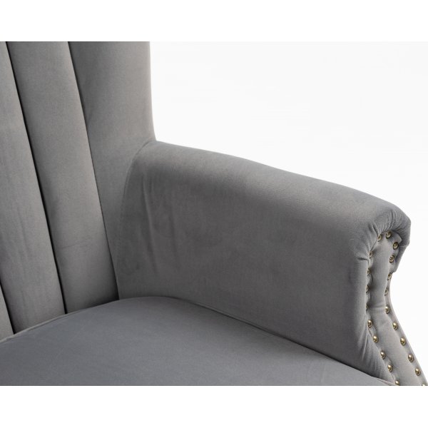 Korvaläpällinen nojatuoli harmaalla samettilla Korvaläpällinen nojatuoli harmaalla samettilla